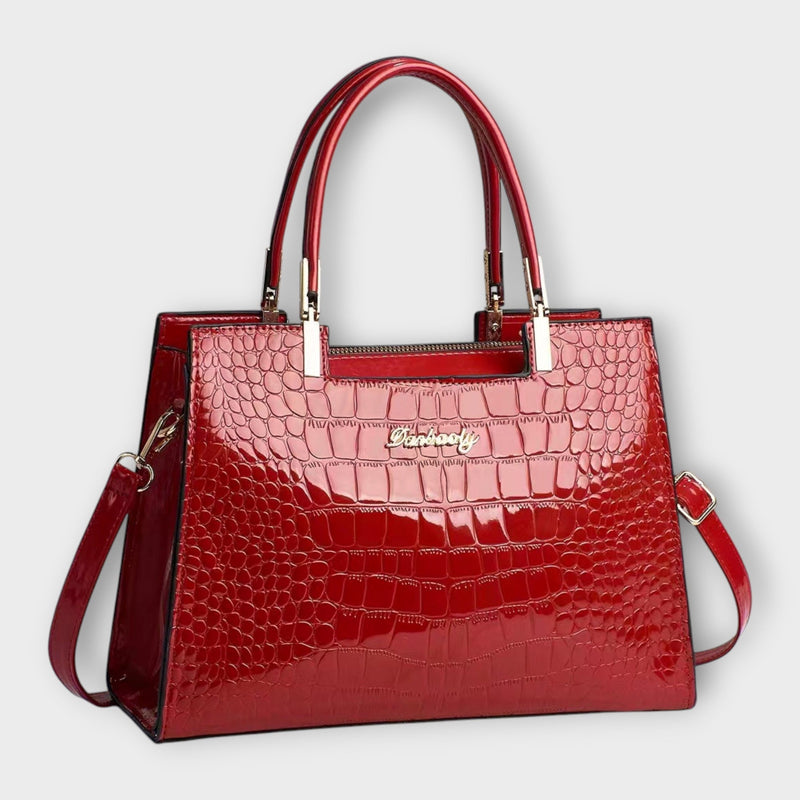 Lora. -  Glänzende Krokodilledermuster-Handtasche