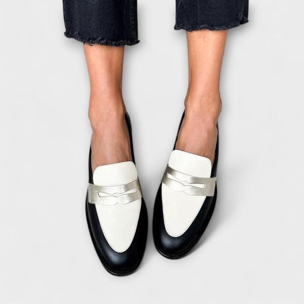 Xara – Schwarze Slipper mit metallischem Glanz