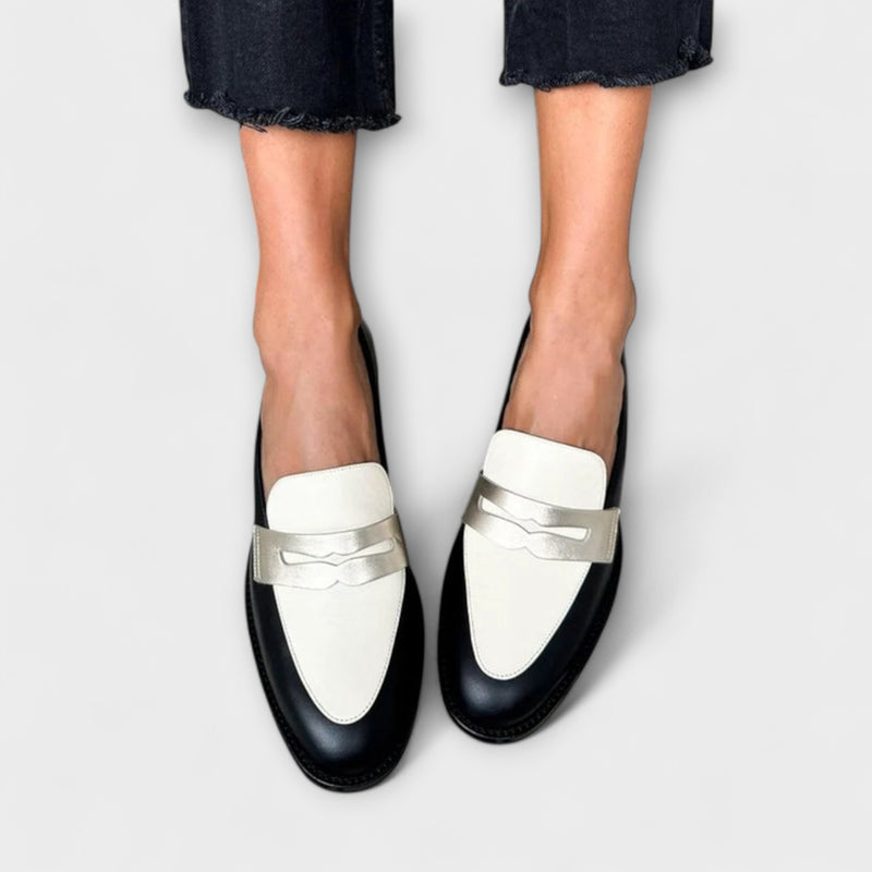 Xara – Schwarze Slipper mit metallischem Glanz