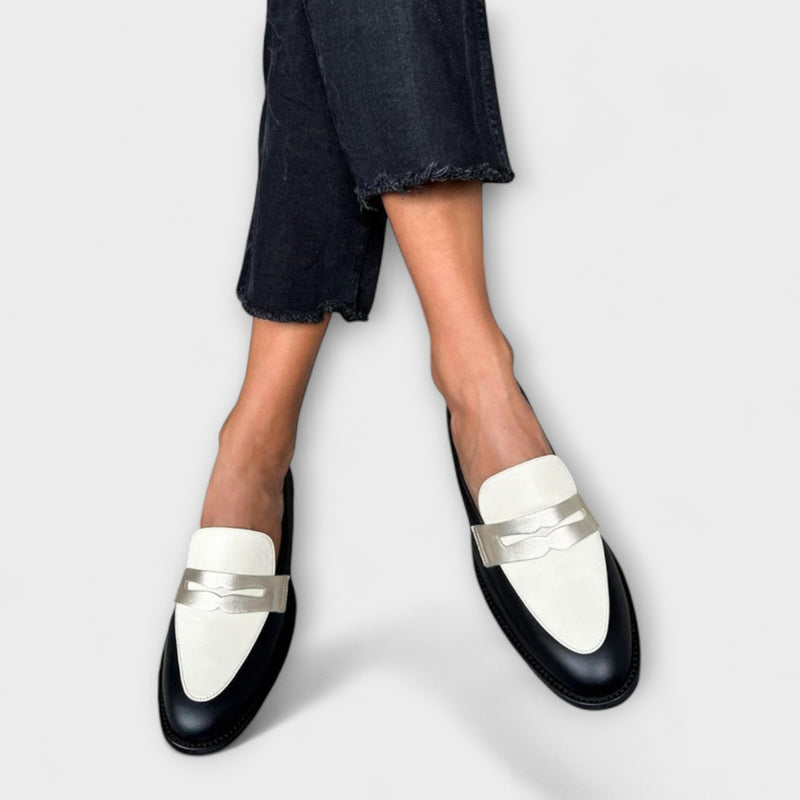 Xara – Schwarze Slipper mit metallischem Glanz