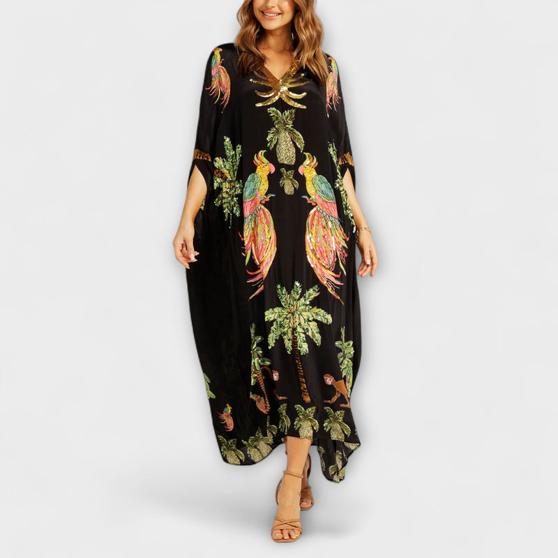 Linda - Auffälliges Kleid mit schrägen Schultern und Kokosbaum-Print