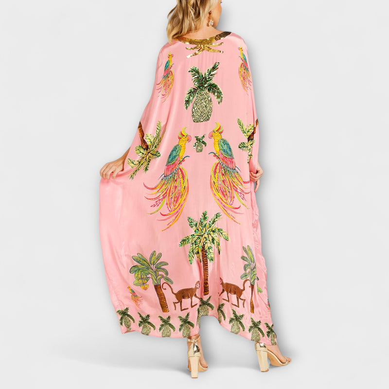 Linda - Auffälliges Kleid mit schrägen Schultern und Kokosbaum-Print
