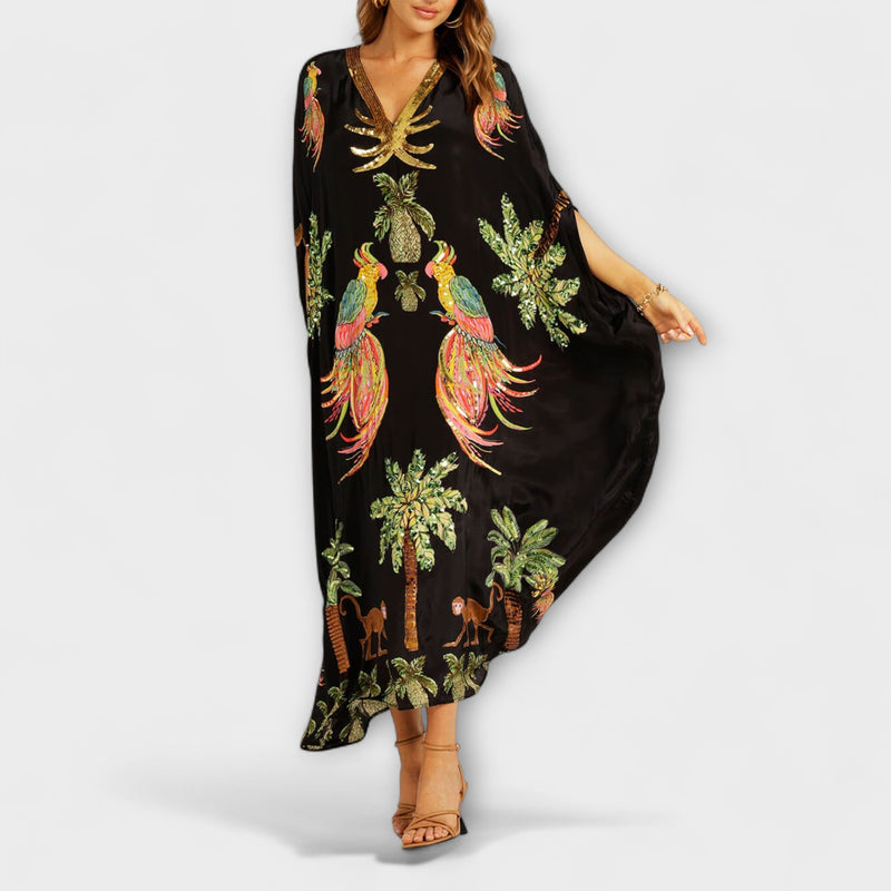 Linda - Auffälliges Kleid mit schrägen Schultern und Kokosbaum-Print