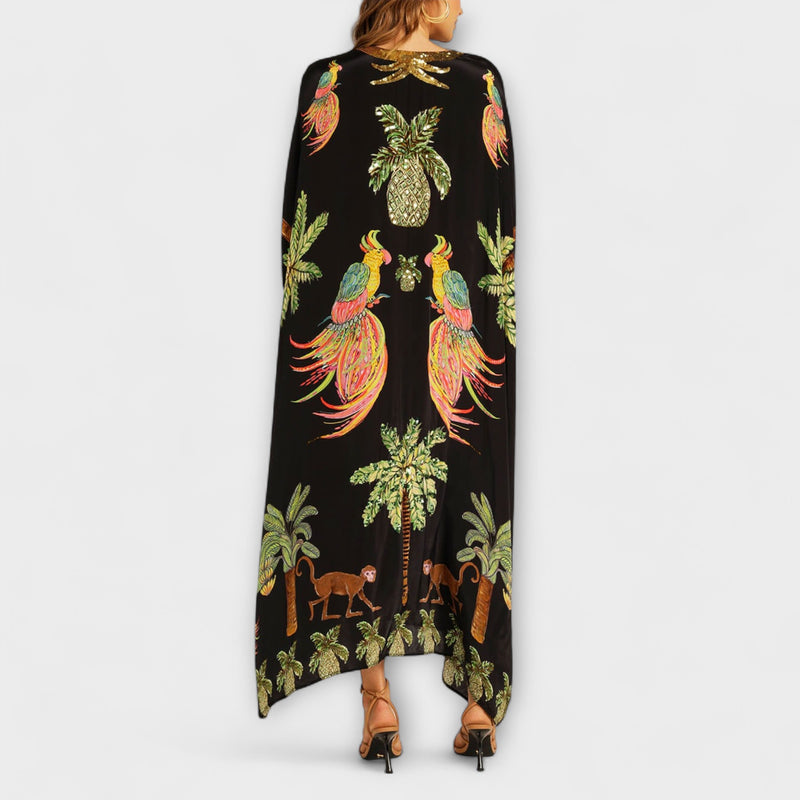 Linda - Auffälliges Kleid mit schrägen Schultern und Kokosbaum-Print